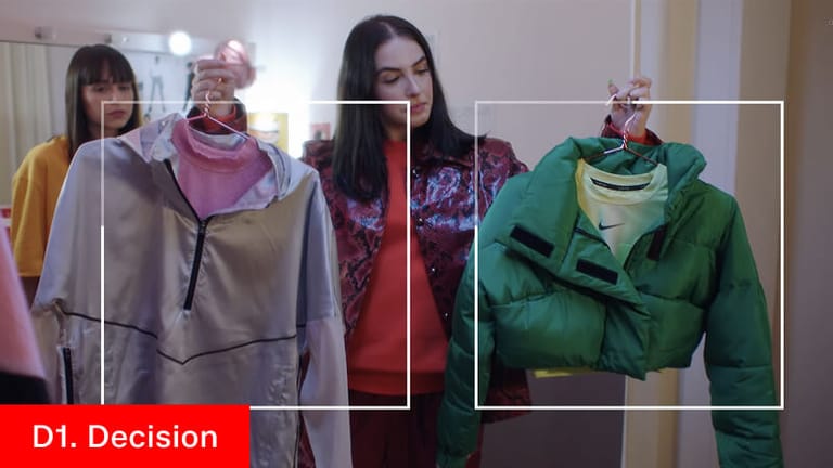 Film still labelled 2. Decision — two jackets framed as selectable options