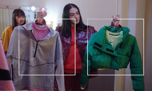 The jacket choice — a grey half-zip and a green puffer framed as options